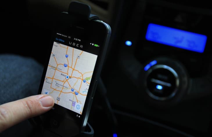 Uber driver Brian Walts locates himself on the Uber map which is part of the ride sharing services that just launched this week on Friday, Feb. 21, 2014, in Houston. ( Mayra Beltran / Houston Chronicle )